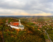 Fantastic arieal photo of Pannonhalama Benedictine abbey in Hungary. Amazing historical building with a beautiful church and library. Popular tourist destination with guided tours