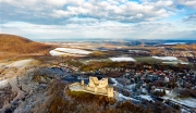 snowy aerial photo about Csesznek castle ruins in Bakony Mountain Hungary. Built was by Jakab Cseszneki in 1263. Amazing historical building ruins.