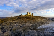snowy aerial photo about Csesznek castle ruins in Bakony Mountain Hungary. Built was by Jakab Cseszneki in 1263. Amazing historical building ruins.