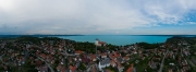 Aerial 180 degrees panoramic photo about Tihany city. Lake Balaton on the background. famous tourist destination with Hungarian monuments church and handmade gifts