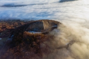 Amazing geological formatoion with fog. Basalt columns hill in upper Balaton region in Hungary. The hungarian name is Hegyesstu.