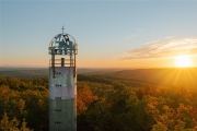Unique geodesic tower next to Szada town in Hungary.  The builders decorated the top of the tower with a Hungarian crown shape what made with steel. Amazing panoramic autunm landscape with sunrise lights