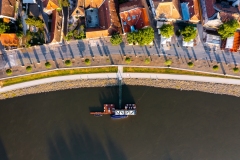Top down view about a part of Szentendre city in Hungary. Amazing aerial shot of the church. Famous tourist attraction is the Danube riverside walkway.