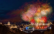 St Sephen memorial day in Budapest Hungary. Celebration fireworks over Danube river. Famous historical Buda castle on the left side  Chain bridge on bottom and Hungarian parliament on  right.