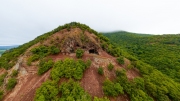 Aerial photo about hermit caves in Danube bend. Fantastic ancient cave in Borzsony mountain. Amazing view of the visegrad hills and Domsod city. Untachable nature place next to Danube river.
