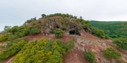 Aerial photo about hermit caves in Danube bend. Fantastic ancient cave in Borzsony mountain. Amazing view of the visegrad hills and Domsod city. Untachable nature place next to Danube river.