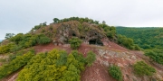 Aerial photo about hermit caves in Danube bend. Fantastic ancient cave in Borzsony mountain. Amazing view of the visegrad hills and Domsod city. Untachable nature place next to Danube river.