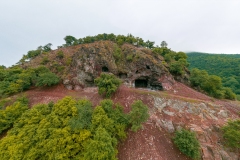 Aerial photo about hermit caves in Danube bend. Fantastic ancient cave in Borzsony mountain. Amazing view of the visegrad hills and Domsod city. Untachable nature place next to Danube river.