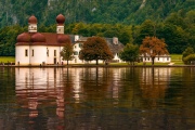 Konigsee lake with st Bartholomew church surrounded by mountains, Berchtesgaden National Park, Bavaria, Germany