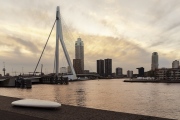 rotterdam citscape near by Erasmus bridge. Amazing colorful photo in sunset time.