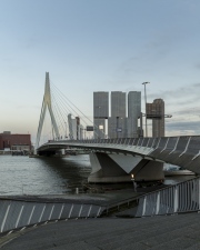 rotterdam citscape near by Erasmus bridge. Amazing colorful photo in sunset time.