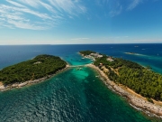 Red island near by Rovinj city in Croatia. Croatian name is Otocic Maskin. It has a hotel, aquapark, chruch monument and amazing beaches