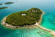 Red island near by Rovinj city in Croatia. Croatian name is Otocic Maskin. It has a hotel, aquapark, chruch monument and amazing beaches