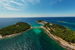 Red island near by Rovinj city in Croatia. Croatian name is Otocic Maskin. It has a hotel, aquapark, chruch monument and amazing beaches