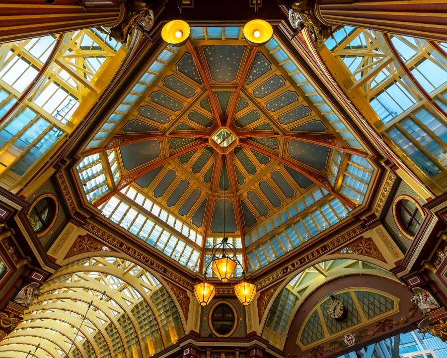 Iconic painted roof of the Leadenhall market. Built in 1881. There are many bars restaurants and shops. Famous tourist sight in London city.