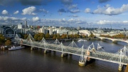Hungerford Bridge and Golden Jubilee Bridges. Charing cross station there is left side.