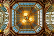 Iconic painted roof of the Leadenhall market. Built in 1881. There are many bars restaurants and shops. Famous tourist sight in London city.