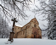 Aerial landscape from Hungar in Bukk Mountains. Scenic view about the Belko mountain andy Belapatfalva town's Cistercian abbey in winter time which coverd fresh snow