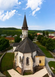 Aerial photo about the Church of the Assumption in Gyongyospata Hungary. Historical religious monument. Built in 12th century romanian baroque and gothic style. popular tourist attraction.