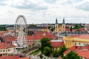 Part of Eger citty with Ferris wheel. Splendid historical city in Hungary. There are old churches, university, a fortres ruin museum and many more