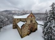 Aerial landscape from Hungar in Bukk Mountains. Scenic view about the Belko mountain andy Belapatfalva town's Cistercian abbey in winter time which coverd fresh snow