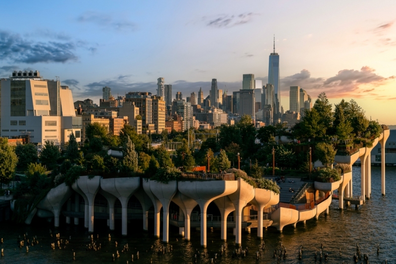 Little Island is on Hudson River Park, Pier 55 in Manhattan. There is a large piublic space what is visitable for free. Iconic Manhattan skyscrapers on the background