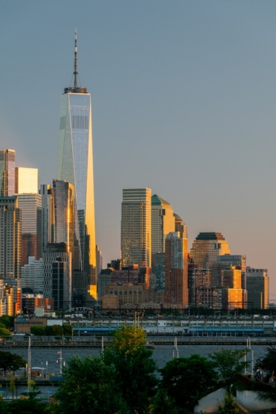 View from Little Island is on Hudson River Park, Pier 55 in Manhattan. There is a large piublic space what is visitable for free. Iconic Manhattan skyscrapers on the background