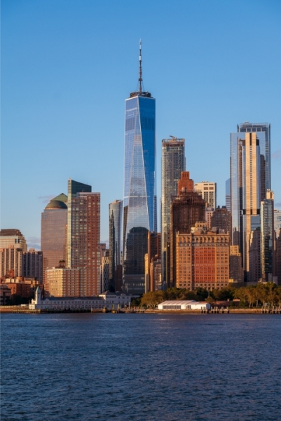 Lower manhattan  cityscape, Scenic andscape with water reflection obut New York city USA. Clear blue sky WTC is on the middle