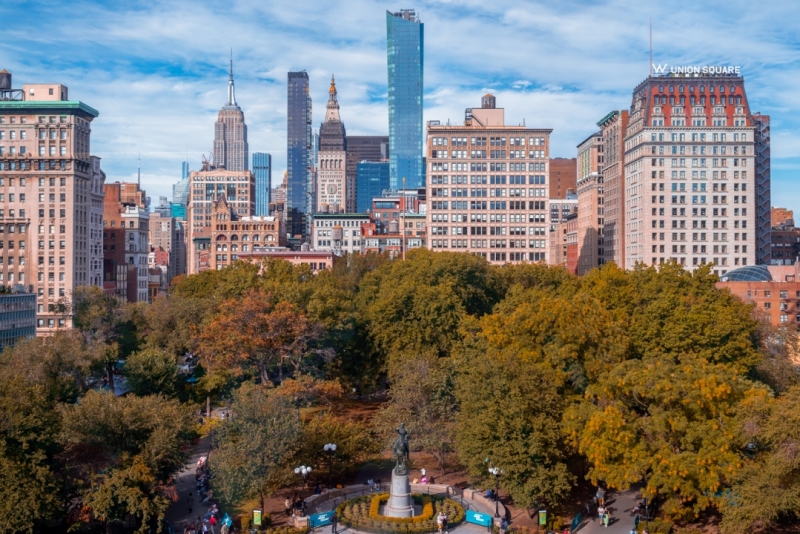 Fall colorfull cityscape about the Union square. The name of the building anfd on the molinos is not a brandname. That is the name of the place. NOT EDITORIAL.
