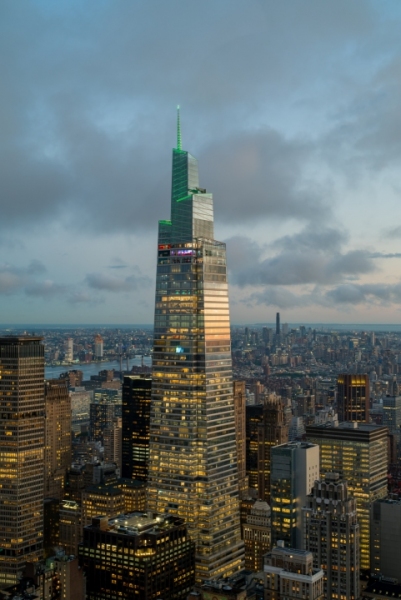 Epic sunset after the rain. Amazing aerial cityscape landscape about New York city, Manhattan. Famous skyscrapers on the photo. Cloud covered high lines.