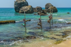 Traditional  fishermens fishing on a stick on the coast of Koggala, Sri Lanka