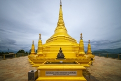 The golden pagoda at Nelligala International Buddhist Centre, Sri Lanka, radiates spiritual serenity, offering a breathtaking view of the surrounding mountains.