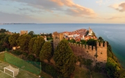 Panoramic photo about piran's old town in Slovenia Amazing morning lights in this peninsula with the Zvonik Campanile Bell Tower what is the landmark this town.