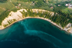 Aerial view about the moon bay slovenia. Unique beach in adriatic sea near by Piran city. Beautiful untouchable nature. It has only one way down to the beach.
