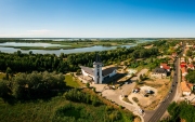 Turistical eco center of lake Tisza in Poroszlo city Hungary.  Hight quality aerial view with Poroszlo cityscape. The visitors can get to know Tisza lake's wildlife. Hungarian name is Tisza to