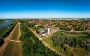 Turistical eco center of lake Tisza in Poroszlo city Hungary.  Hight quality aerial view with Poroszlo cityscape. The visitors can get to know Tisza lake's wildlife. Hungarian name is Tisza to