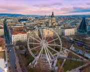 Ferris wheel In Hungary Budapest. Erzsebet square, St Stephen Basilica, Andrassy street. Budapest Eye