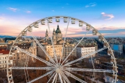 Ferris wheel In Hungary Budapest. Erzsebet square, St Stephen Basilica, Andrassy street. Budapest Eye