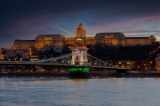 The famous Chain bridge in Budapest festive illuminated with national flag colours due national celebrate day. Zhis day is march 15. the memorial day od 1848-48 revolutional liberty war