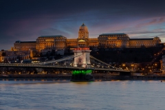 The famous Chain bridge in Budapest festive illuminated with national flag colours due national celebrate day. Zhis day is march 15. the memorial day od 1848-48 revolutional liberty war