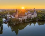 Amazing aerial view about the Vajdahunyad castle in the city park of Budapest Hungary. This gothic stlye historical builing it has next to Szechenyi thremal bath. Famous popular tourist attraction