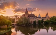 Amazing aerial view about the Vajdahunyad castle in the city park of Budapest Hungary. This gothic stlye historical builing it has next to Szechenyi thremal bath. Famous popular tourist attraction
