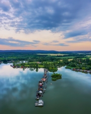 Lake Bokod next to Oroszlany city in Hungary. This is a man-made cooling lake for the power plant what there is shore. Here is the famous fishing floating village too.