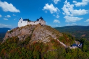 Füzér, Hungary - Aerial view of the famous castle of Fuzer built on a volcanic hill named Nagy-Milic. Zemplen mountains at the background. Winter landscape. Hungarian name is Füzér vára.